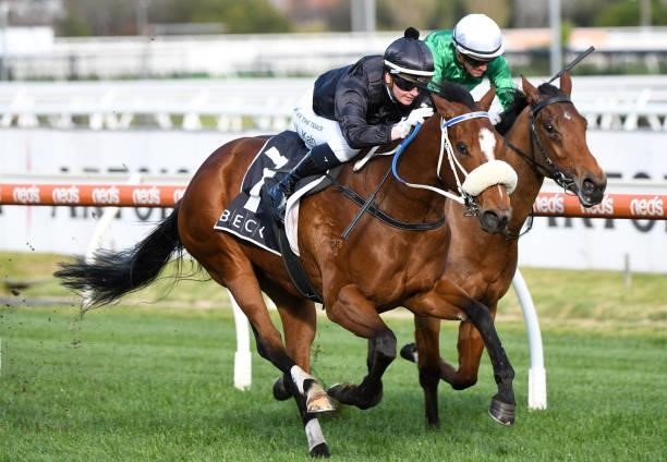 Jamie Kah riding Gimmie Par winning Race 7, the Beck Probuild Quezette Stakes, during Melbourne Racing at Caulfield Racecourse on August 14, 2021 in...