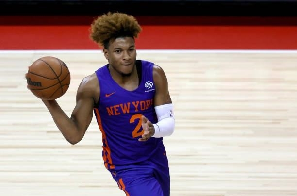 Miles McBride of the New York Knicks passes against the Detroit Pistons during the 2021 NBA Summer League at the Thomas & Mack Center on August 13,...