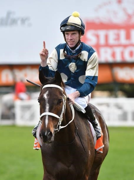 John Allen riding Sierra Sue after winning Race 8, the P.b. Lawrence Stakes, during Melbourne Racing at Caulfield Racecourse on August 14, 2021 in...