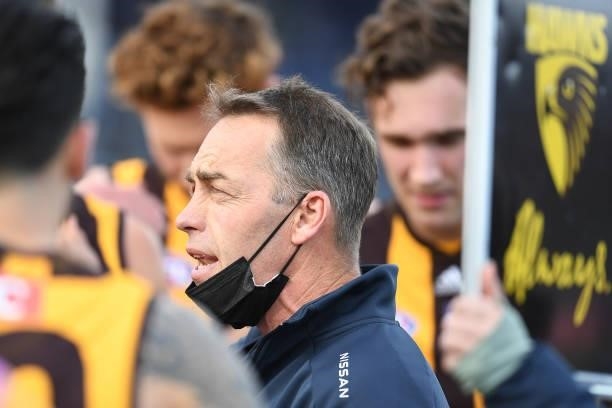 Alastair Clarkson Head Coach of the Hawks addresses the players during the round 22 AFL match between Hawthorn Hawks and Western Bulldogs at...
