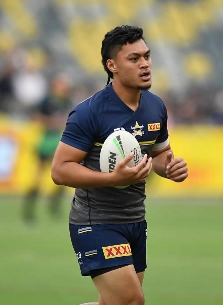 Jeremiah Nanai of the Cowboys warms up before the start of the round 22 NRL match between the North Queensland Cowboys and the Wests Tigers at QCB...