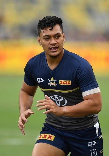 Jeremiah Nanai of the Cowboys warms up before the start of the round 22 NRL match between the North Queensland Cowboys and the Wests Tigers at QCB...