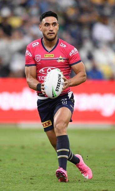 Valentine Holmes of the Cowboys runs the ball during the round 22 NRL match between the North Queensland Cowboys and the Wests Tigers at QCB Stadium,...