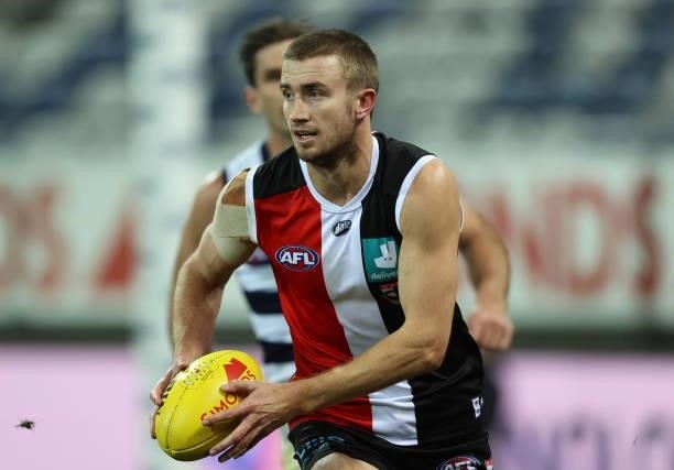 Dougal Howard of the Saints runs with the ball during the round 22 AFL match between Geelong Cats and St Kilda Saints at GMHBA Stadium on August 14,...