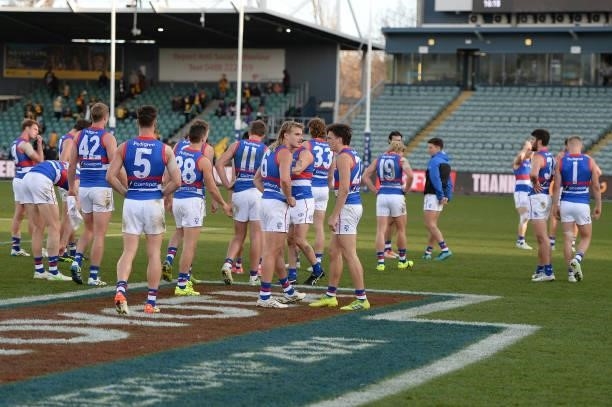 Western Bulldogs leave the field after the game during the round 22 AFL match between Hawthorn Hawks and Western Bulldogs at University of Tasmania...