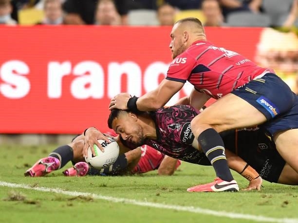 Kelma Tuilagi of the Tigers scores a try during the round 22 NRL match between the North Queensland Cowboys and the Wests Tigers at QCB Stadium, on...