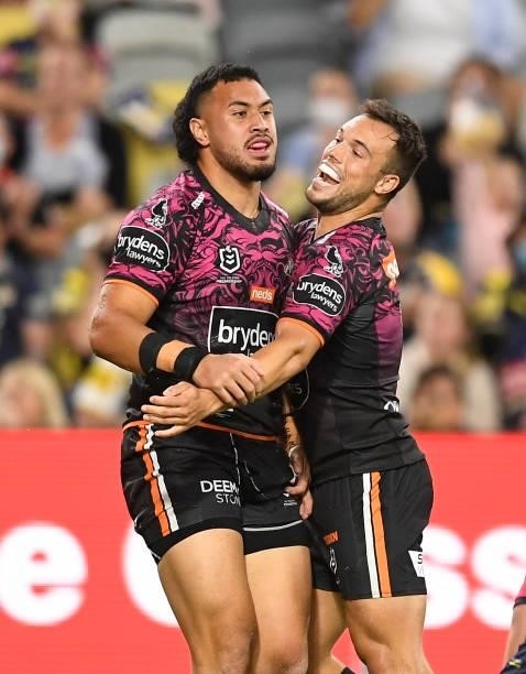 Kelma Tuilagi of the Tigers celebrates after scoring a try during the round 22 NRL match between the North Queensland Cowboys and the Wests Tigers at...