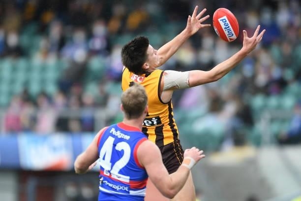 Mitch Lewis of the Hawks takes a mark during the round 22 AFL match between Hawthorn Hawks and Western Bulldogs at University of Tasmania Stadium on...