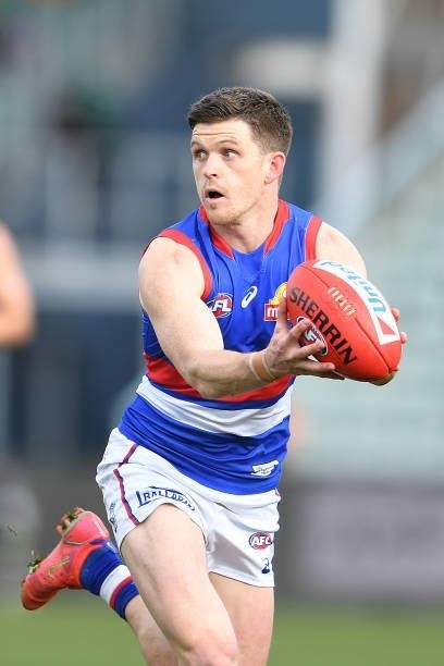 Mitch Hannan of the Bulldogs in action during the round 22 AFL match between Hawthorn Hawks and Western Bulldogs at University of Tasmania Stadium on...