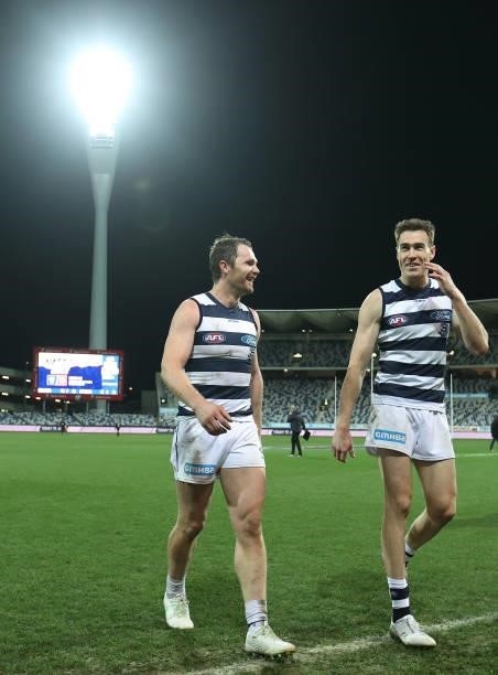 Patrick Dangerfield and Jeremy Cameron of the Cats are seen after the Cats defeated the Saints during the round 22 AFL match between Geelong Cats and...