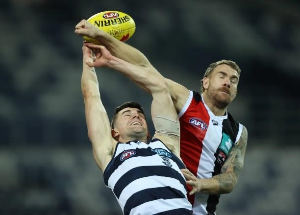 Mark O'Connor of the Cats and Dean Kent of the Saints compete for the ball during the round 22 AFL match between Geelong Cats and St Kilda Saints at...