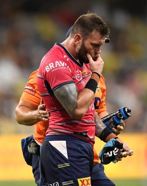 Kyle Feldt of the Cowboys comes from the field after being injured during the round 22 NRL match between the North Queensland Cowboys and the Wests...