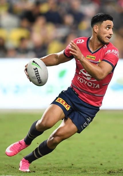 Valentine Holmes of the Cowboys runs the ball during the round 22 NRL match between the North Queensland Cowboys and the Wests Tigers at QCB Stadium,...