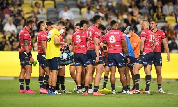 The Cowboys gather in a huddle during the round 22 NRL match between the North Queensland Cowboys and the Wests Tigers at QCB Stadium, on August 14...