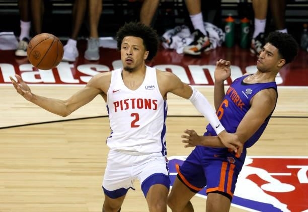 Cade Cunningham of the Detroit Pistons loses the ball as he is guarded by Quentin Grimes of the New York Knicks during the 2021 NBA Summer League at...
