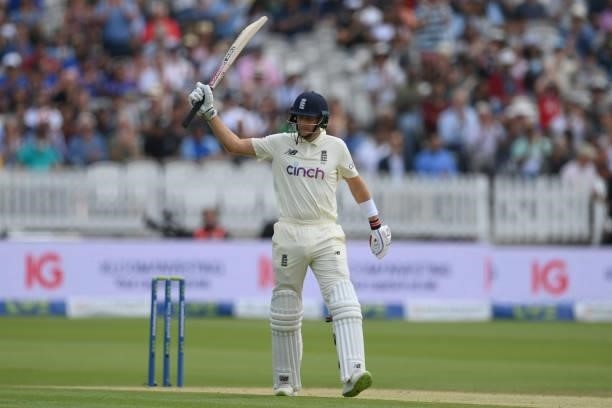 Joe Root of England celebrates reaching his 50 during the Second LV= Insurance Test Match: Day Three between England and India at Lord's Cricket...