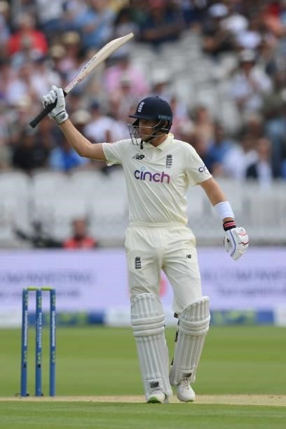 Joe Root of England celebrates reaching his 50 during the Second LV= Insurance Test Match: Day Three between England and India at Lord's Cricket...