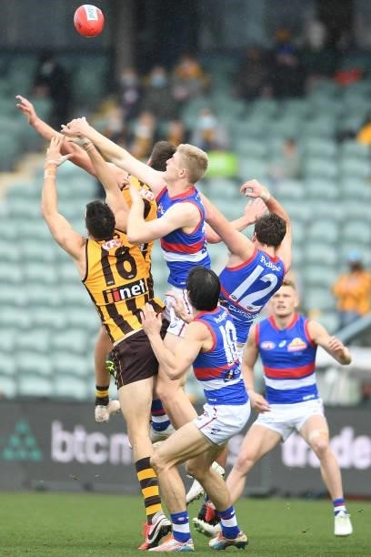 Tim English of the Bulldogs contests the ball during the round 22 AFL match between Hawthorn Hawks and Western Bulldogs at University of Tasmania...