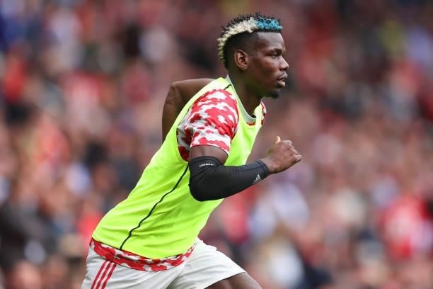 Paul Pogba of Manchester United warms up prior to the Premier League match between Manchester United and Leeds United at Old Trafford on August 14,...