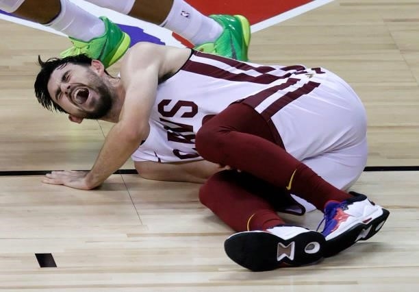 Chandler Vaudrin of the Cleveland Cavaliers reacts after he suffered an injury during a game against the New Orleans Pelicans during the 2021 NBA...