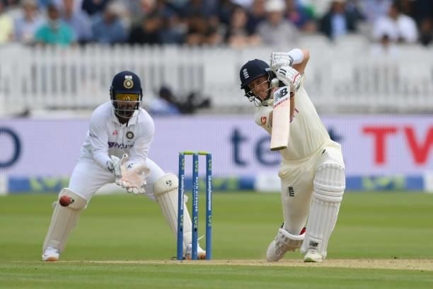Joe Root of England hits out as Rishabh Pant of India looks on during the Second LV= Insurance Test Match: Day Three between England and India at...