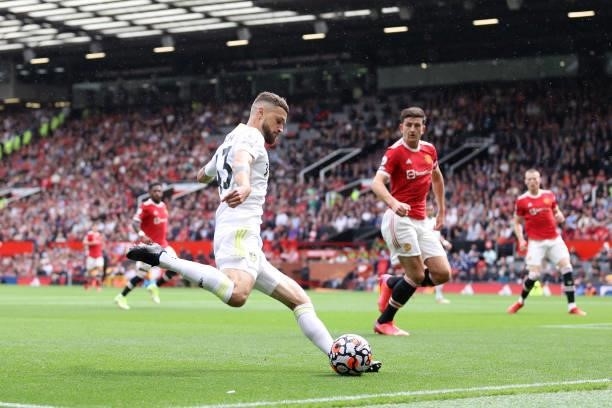 Mateusz Klich of Leeds United looks to cross the ball during the Premier League match between Manchester United and Leeds United at Old Trafford on...