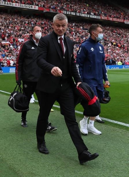 Manager Ole Gunnar Solskjaer of Manchester United walks out ahead of the Premier League match between Manchester United and Leeds United at Old...