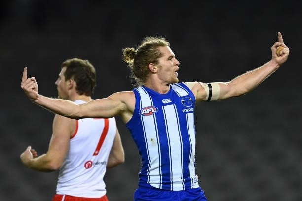 Jed Anderson of the Kangaroos celebrates kicking a goal during the round 22 AFL match between North Melbourne Kangaroos and Sydney Swans at Marvel...