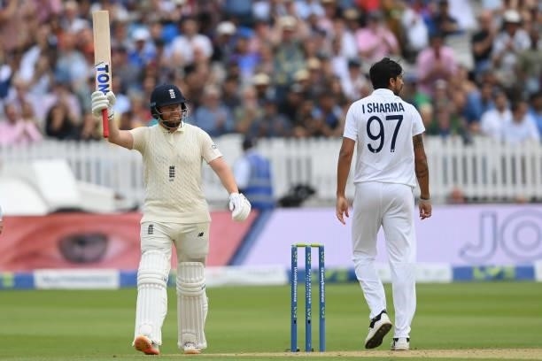 Jonny Bairstow of England raises his bat after reaching 50 during the Second LV= Insurance Test Match: Day Three between England and India at Lord's...
