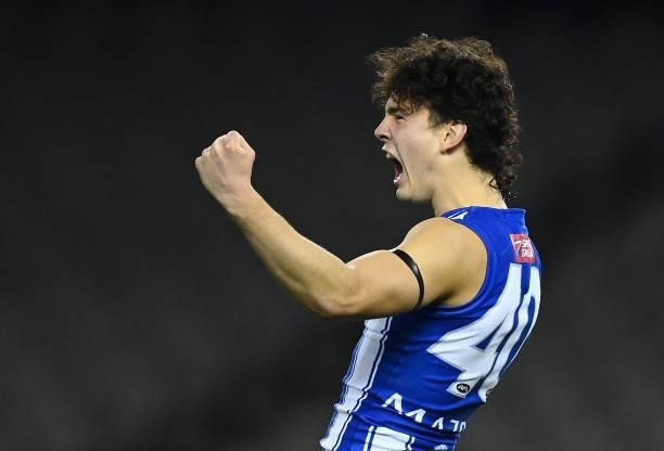 Eddie Ford of the Kangaroos celebrates kicking a goal during the round 22 AFL match between North Melbourne Kangaroos and Sydney Swans at Marvel...