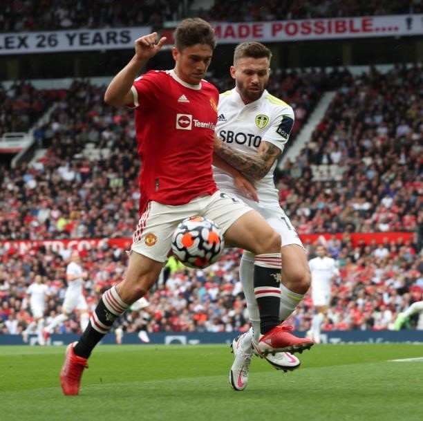 Daniel James of Manchester United in action with Stuart Dallas of Leeds United during the Premier League match between Manchester United and Leeds...