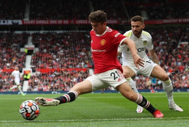 Daniel James of Manchester United in action with Stuart Dallas of Leeds United during the Premier League match between Manchester United and Leeds...