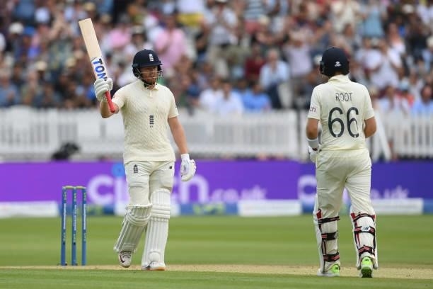 Jonny Bairstow of England celebrates with Joe Root after reaching 50 during the Second LV= Insurance Test Match: Day Three between England and India...