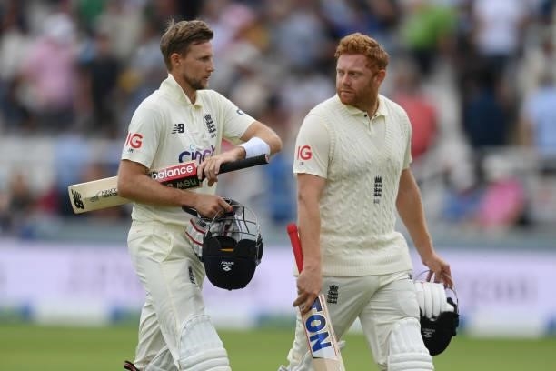 Jonny Bairstow and Joe Root of England walk off for lunch after sharing an unbeaten century partnership during the Second LV= Insurance Test Match:...
