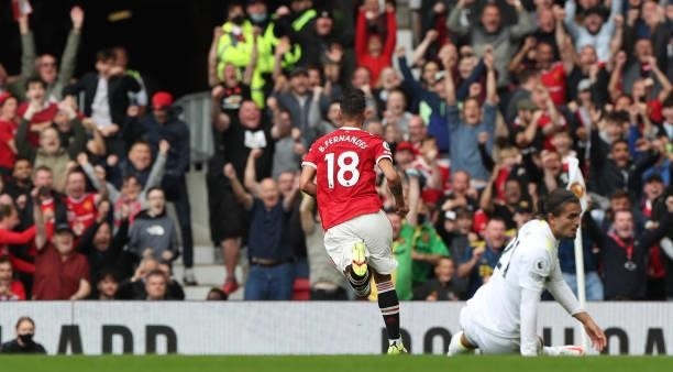 Bruno Fernandes of Manchester United celebrates scoring their first goal during the Premier League match between Manchester United and Leeds United...