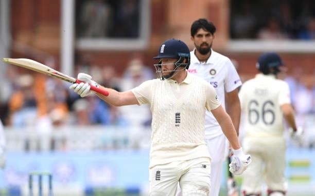 England batsman Jonny Bairstow reaches 50 during day three of the Second Test Match between England and India at Lord's Cricket Ground on August 14,...
