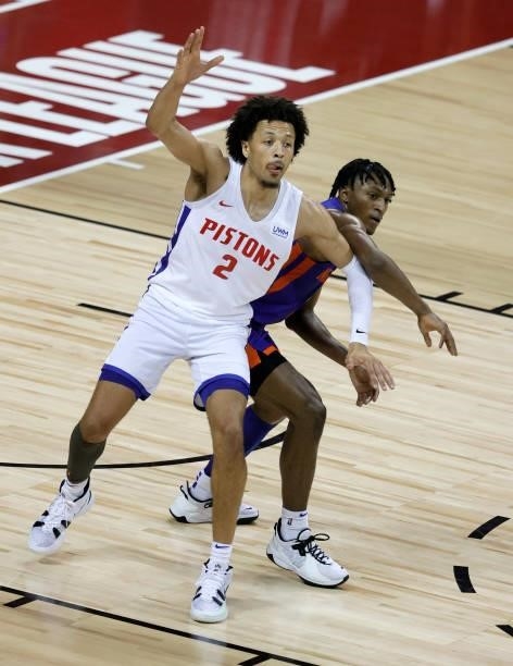 Cade Cunningham of the Detroit Pistons and Immanuel Quickley of the New York Knicks fight for position during the 2021 NBA Summer League at the...