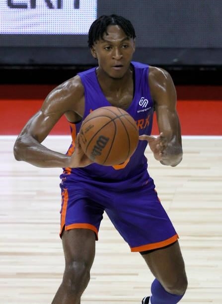 Immanuel Quickley of the New York Knicks looks to pass against the Detroit Pistons during the 2021 NBA Summer League at the Thomas & Mack Center on...