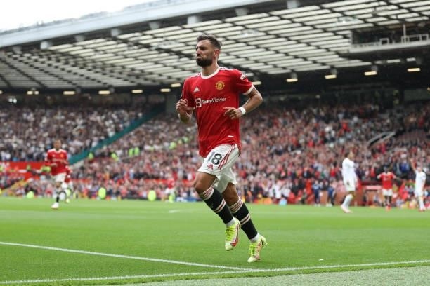 Bruno Fernandes of Manchester United celebrates after scoring their side's fourth goal during the Premier League match between Manchester United and...