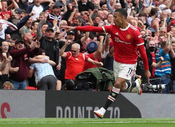 Mason Greenwood of Manchester United celebrates scoring their second goal during the Premier League match between Manchester United and Leeds United...