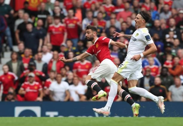 Bruno Fernandes of Manchester United scores their third goal during the Premier League match between Manchester United and Leeds United at Old...