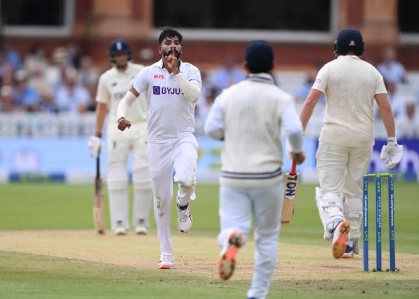 India bowler Mohammed Siraj celebrates after taking the wicket of England batsman Jonny Bairstow during day three of the Second Test Match between...