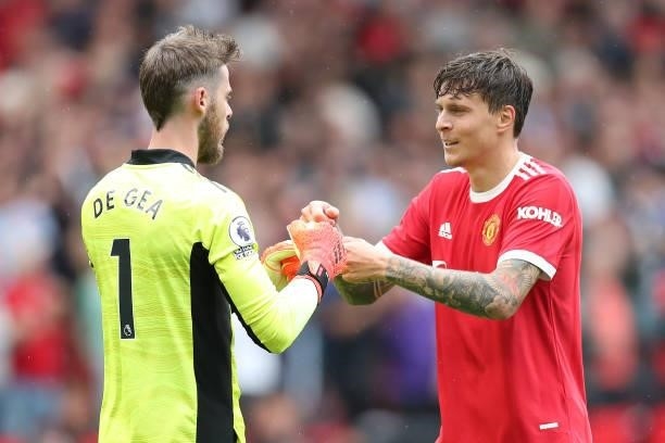 David de Gea and Victor Lindelof of Manchester United interact following victory in the Premier League match between Manchester United and Leeds...