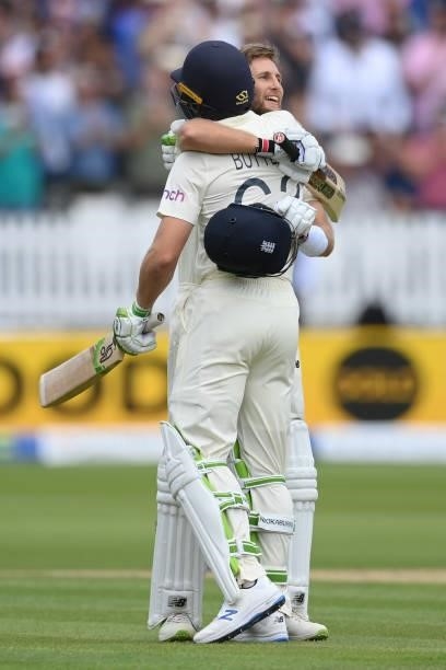Joe Root of England celebrates with Jos Buttler after reaching his century during the Second LV= Insurance Test Match: Day Three between England and...