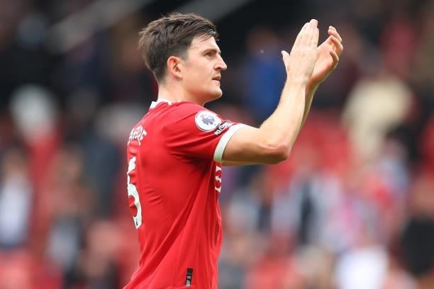 Harry Maguire of Manchester United applauds the fans following victory in the Premier League match between Manchester United and Leeds United at Old...