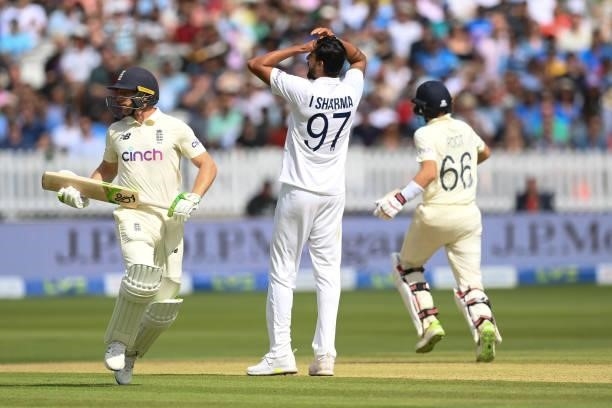 Jos Buttler and Joe Root of England take a run as bowler Ishant Sharma of India looks on during the Second LV= Insurance Test Match: Day Three...