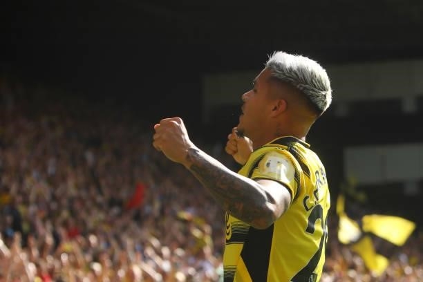 Cucho Hernandez of Watford celebrates after scoring their side's third goal during the Premier League match between Watford and Aston Villa at...