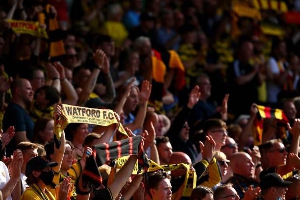 Watford fans show their support during the Premier League match between Watford and Aston Villa at Vicarage Road on August 14, 2021 in Watford,...