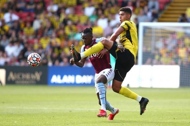 Bertrand Traore of Aston Villa and Adam Masina of Watford battle for possession during the Premier League match between Watford and Aston Villa at...