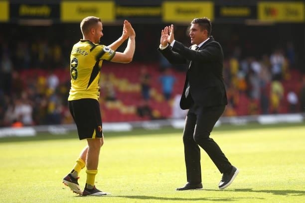 Xisco Munoz, Manager of Watford and Tom Cleverley of Watford interact following victory in the Premier League match between Watford and Aston Villa...